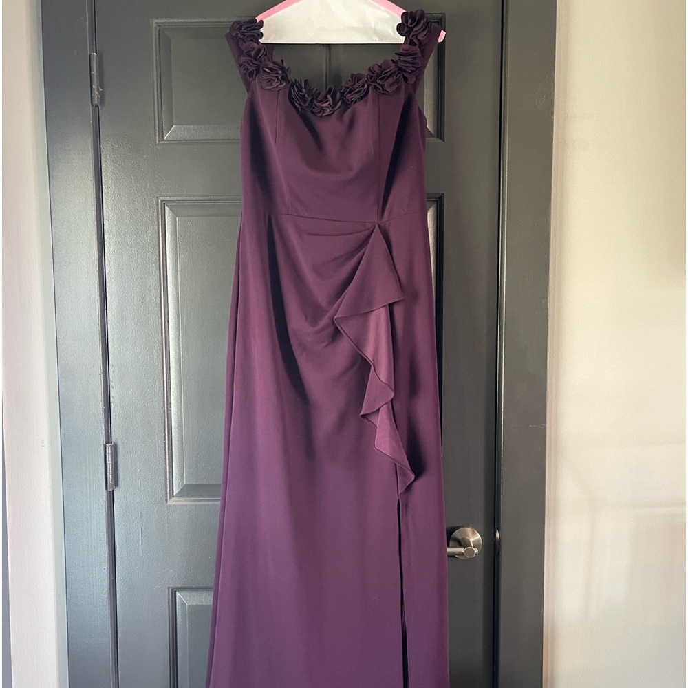 Formal eggplant off the shoulder gown. Beautiful rosette detail.